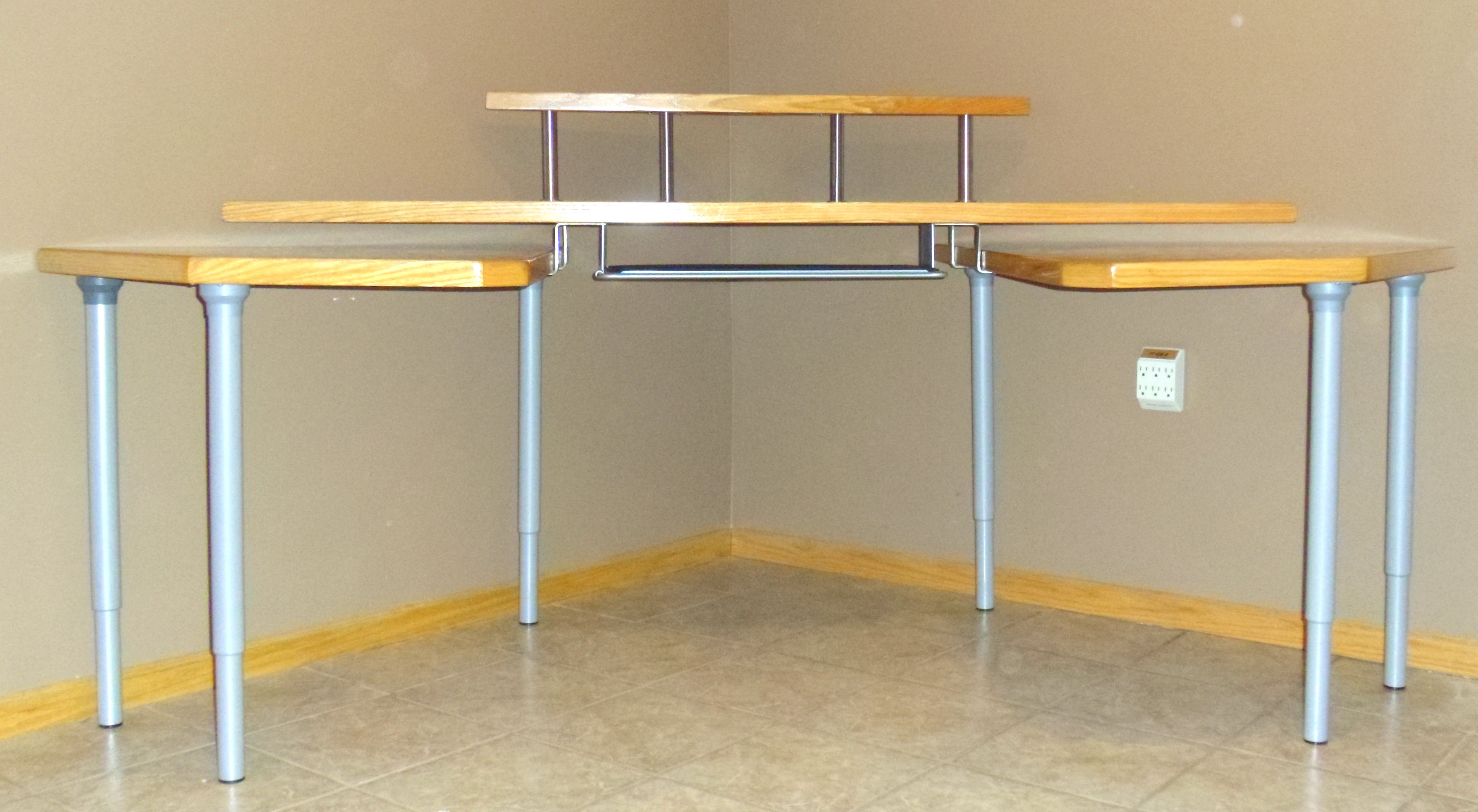 Maverick Corner Wheelchair Desk with six height adjustable legs -  front view at desk height