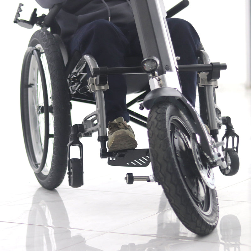 Sähköinen käsikäyttö manuaalisille pyörätuoleille