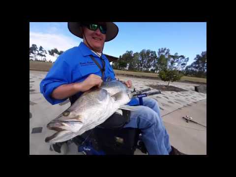 Video of  huge fish caught by disabled  quadriplegic wheelchair user in Australia with hands-on wheelchair seat adaptive fishing rod holder