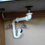 Plumbing Trap at the Wall under bathroom sink for Wheelchair Accessibility